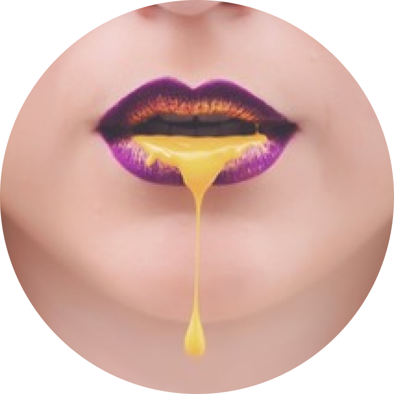 women mouth with yellow paint